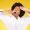 woman yawning while wearing a bathrobe